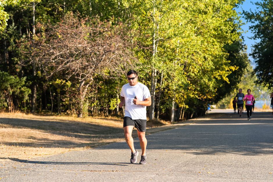 Active adult running on an outdoor trail in the Treasure Valley area