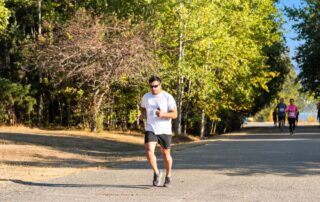 Active adult running on an outdoor trail in the Treasure Valley area